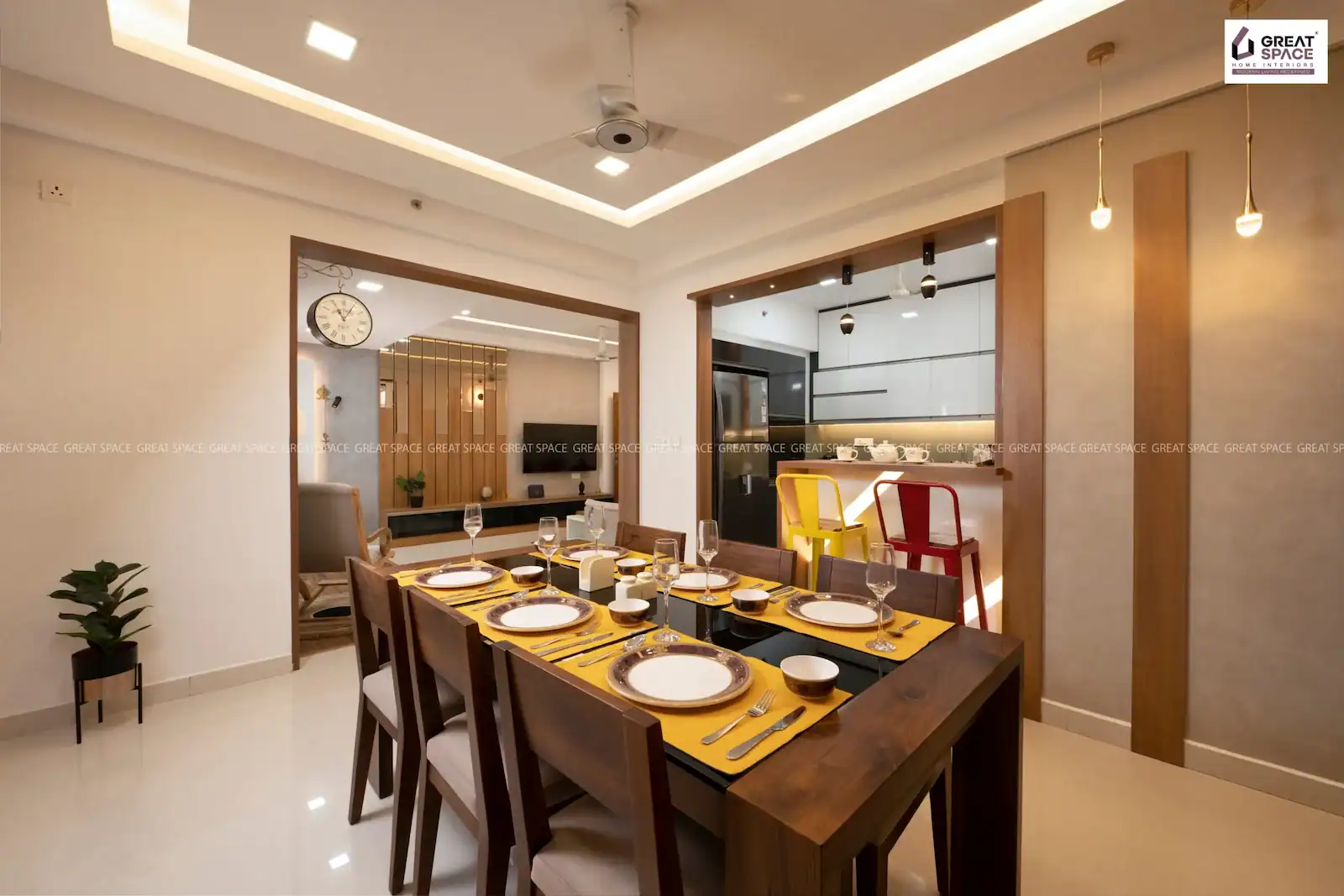 Dining area with wooden table connected to living and kitchen spaces, Vyttila apartment